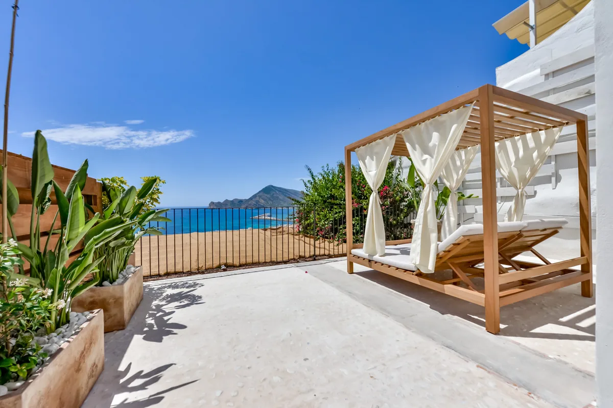 Rooftop terrace of Las Torres with a Bali bed overlooking the bay of Altea
