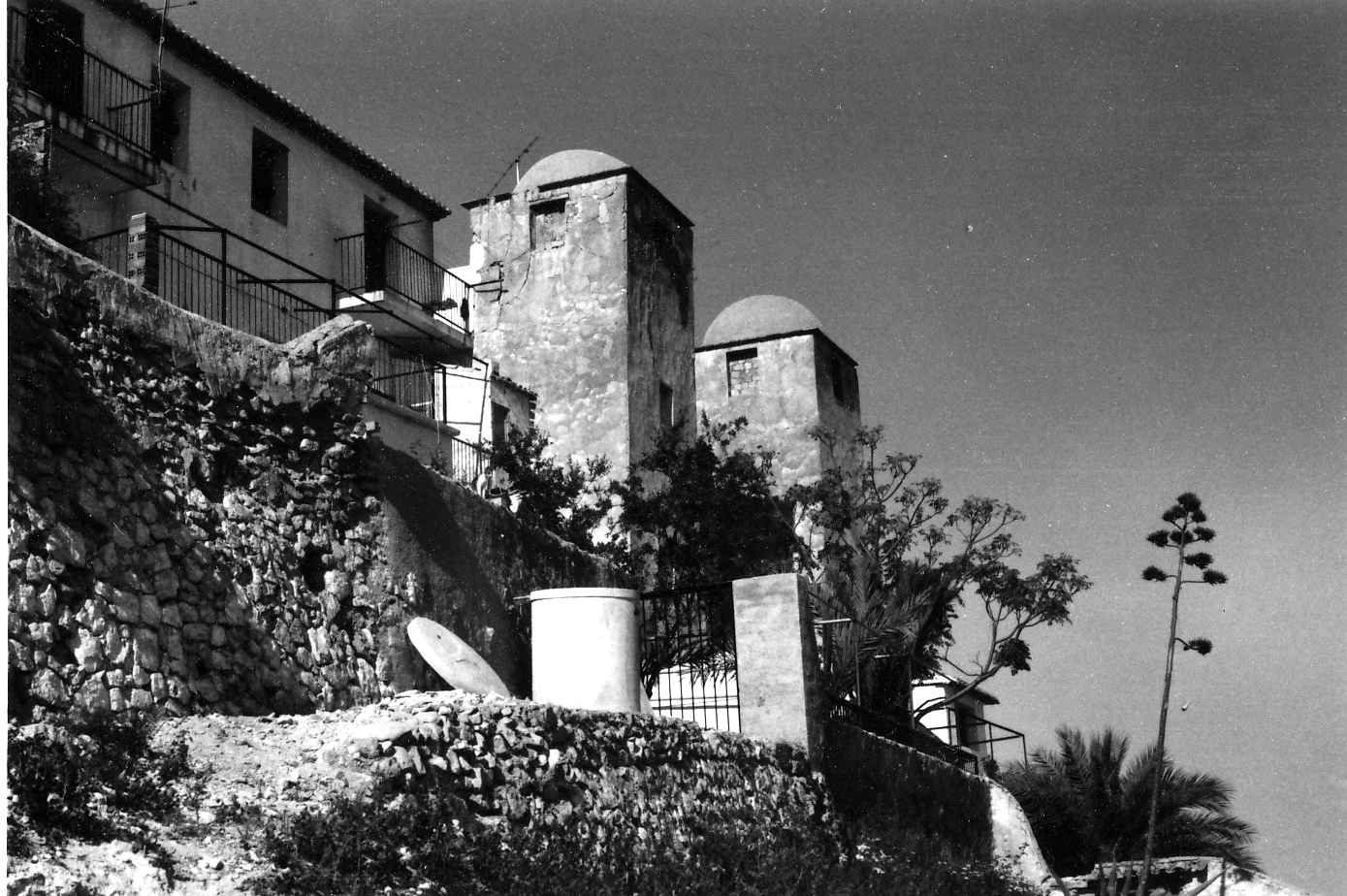 Archive photograph of the two original towers of the Casa de las Torres