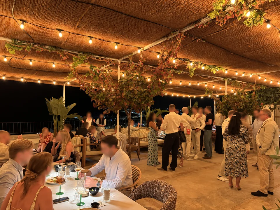 An evening celebration beneath the terrace lights at Las Torres